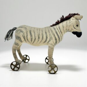 Ancien jouet à tirer zèbre en mohair STEIFF